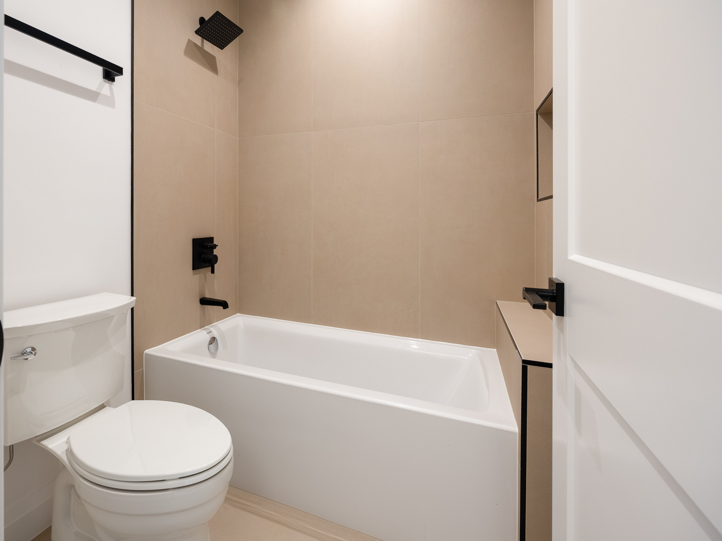 410 Prairie Avenue Wilmette, IL 60091 - Photo 27 of 44 a white bath tub sitting next to a toilet