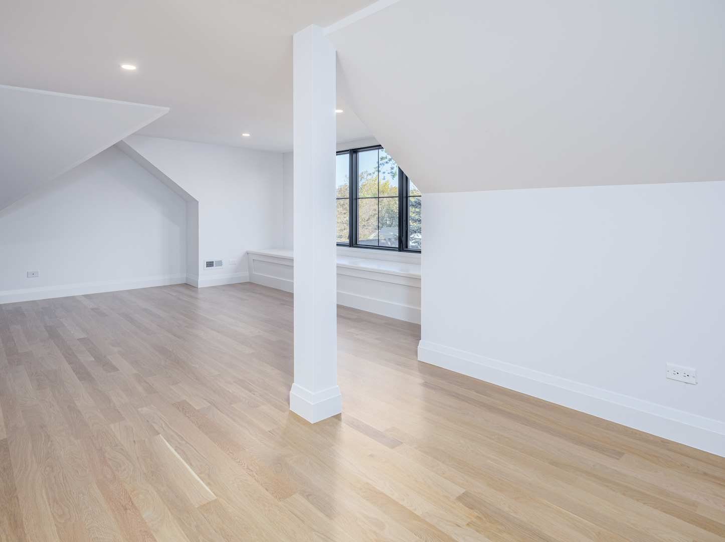 410 Prairie Avenue Wilmette, IL 60091 - Photo 34 of 44 wooden floor in an empty room with a window
