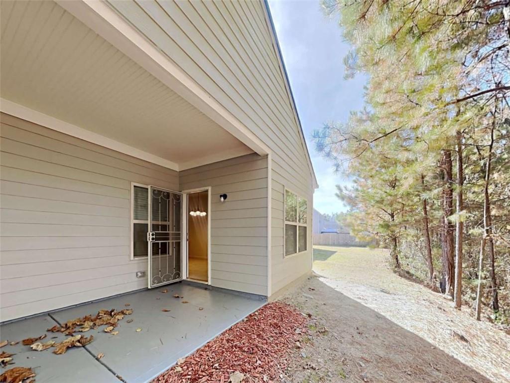 557 Scotland Drive Dallas, GA 30132 - Photo 14 of 28 a view of a house with a yard