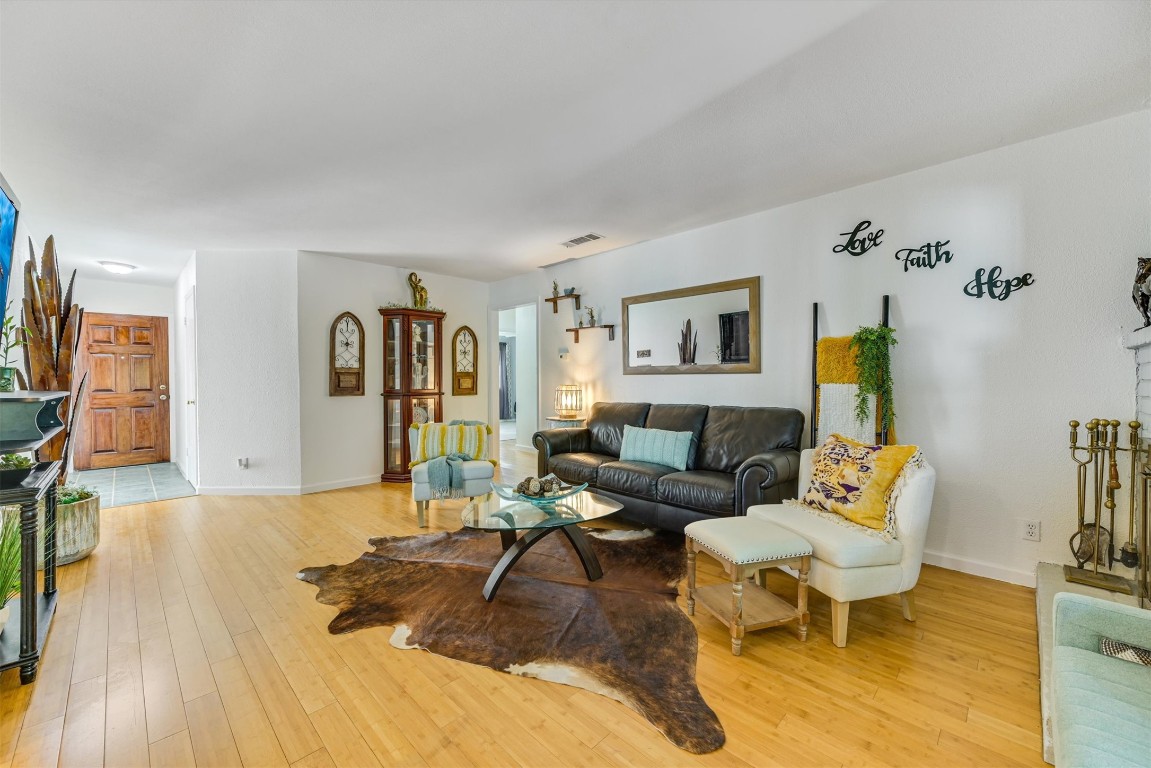 2201 Tallow Court Austin, TX 78744 - Photo 4 of 21 a living room with furniture and wooden floor