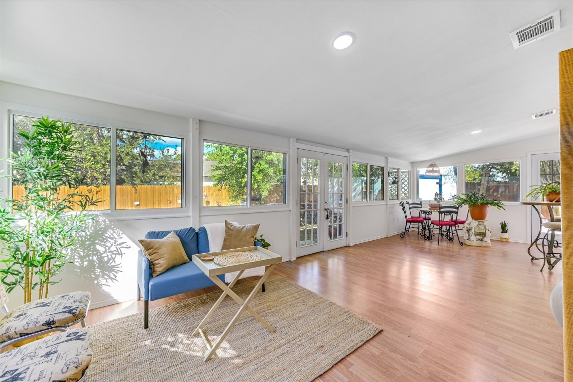 2201 Tallow Court Austin, TX 78744 - Photo 9 of 21 a living room with furniture and a wooden floor