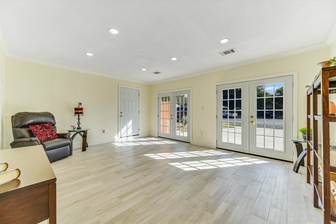2201 Tallow Court Austin, TX 78744 - Photo 10 of 21 a view of a livingroom with furniture and workspace