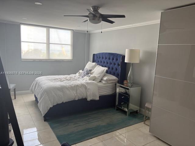 9273 Collins Avenue, Unit 407 Surfside, FL 33154 - Photo 5 of 10 a bedroom with a bed and a window