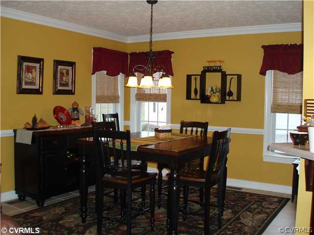 19901 Legend Road Carson, VA 23830 - Photo 8 of 12 a view of a dining room with furniture and window