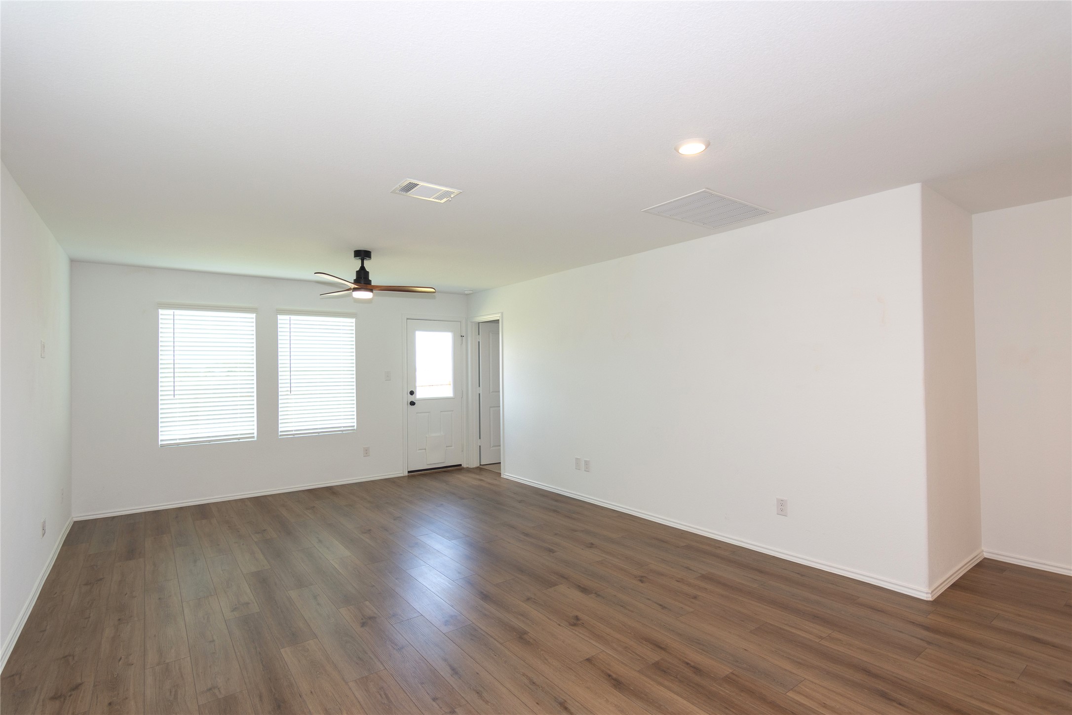 548 Rancho Del Cielo Loop Jarrell, TX 76537 - Photo 9 of 40 The Dining Room can easily accommodate a table for six.