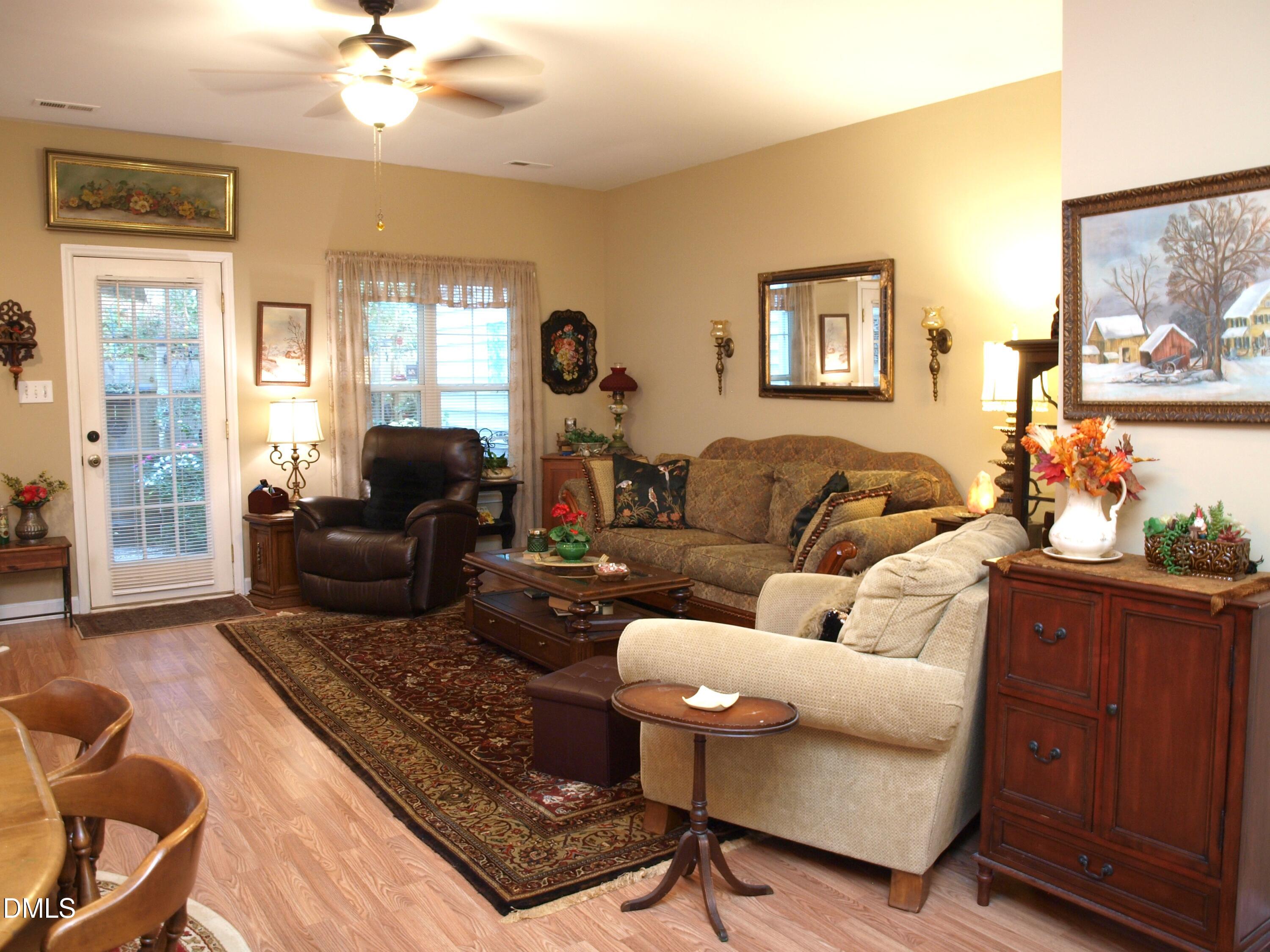801 Genford Court Raleigh, NC 27609 - Photo 8 of 18 a living room with furniture