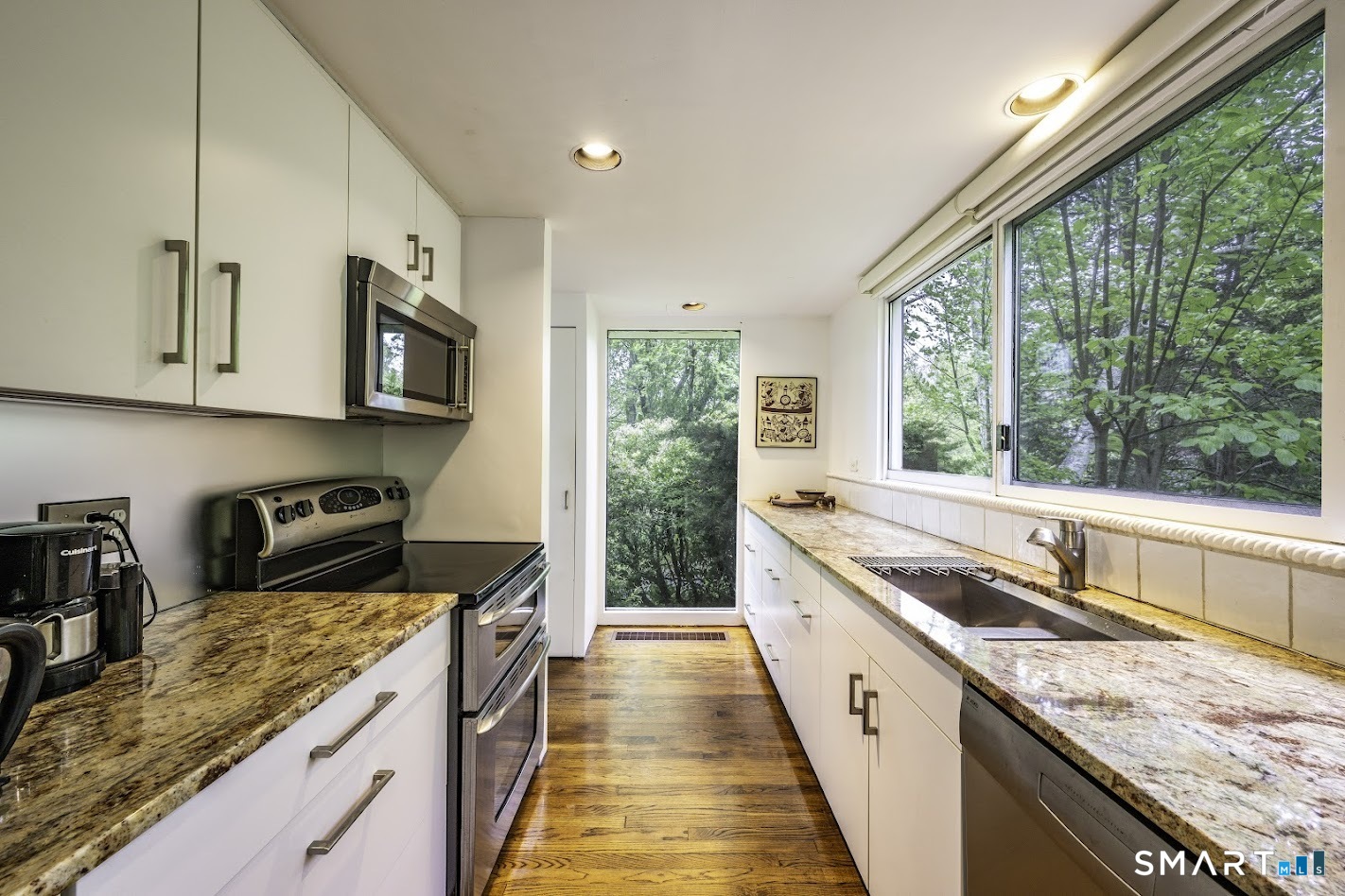 370 R Maiden Lane Durham, CT 06422 - Photo 10 of 28 A kitchen where every meal comes with a view. Clean lines, warm finishes, and nature just beyond the window.