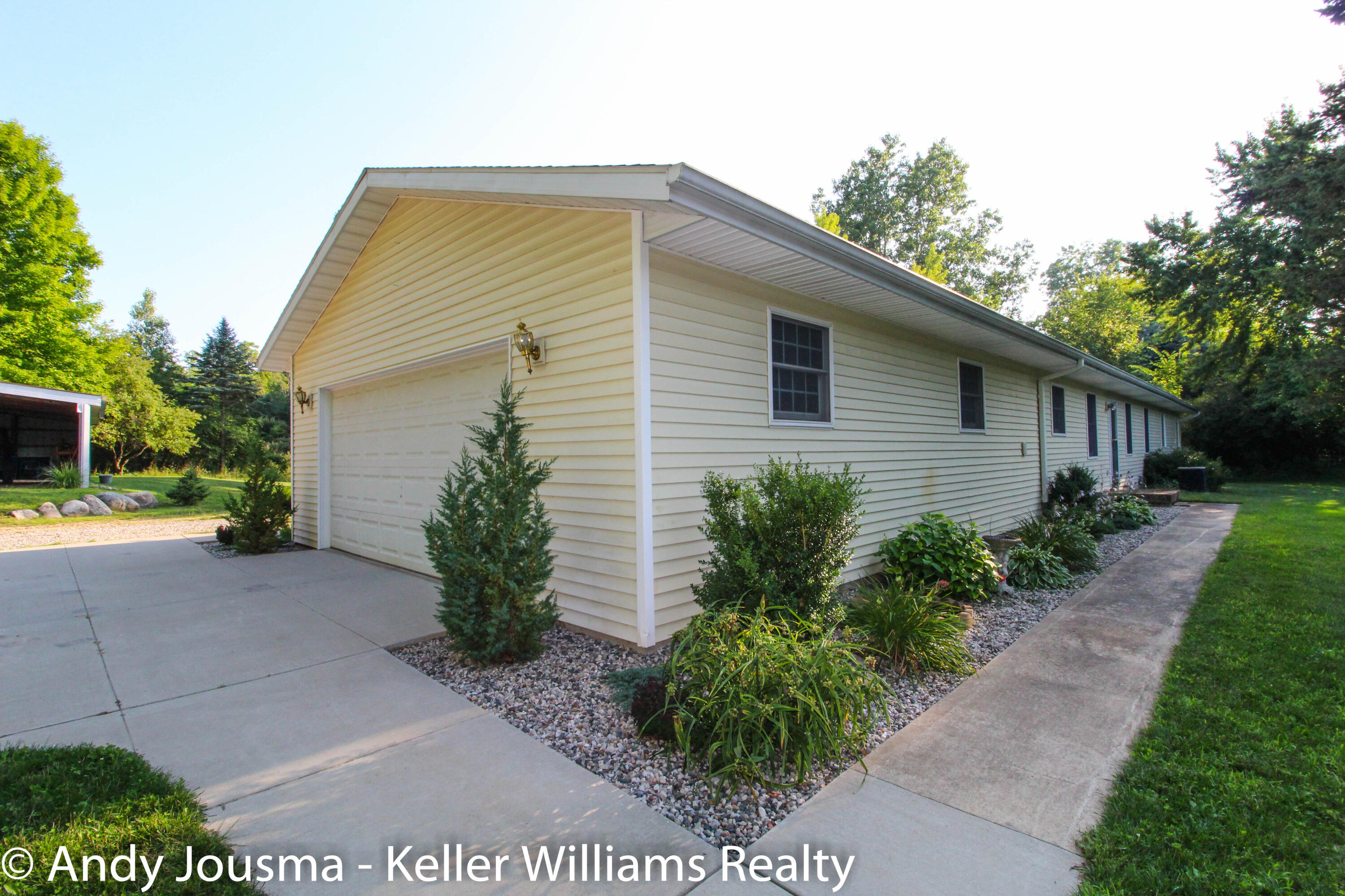 6068 Rocky Road Lowell, MI 49331 - Photo 1 of 40 Front Left