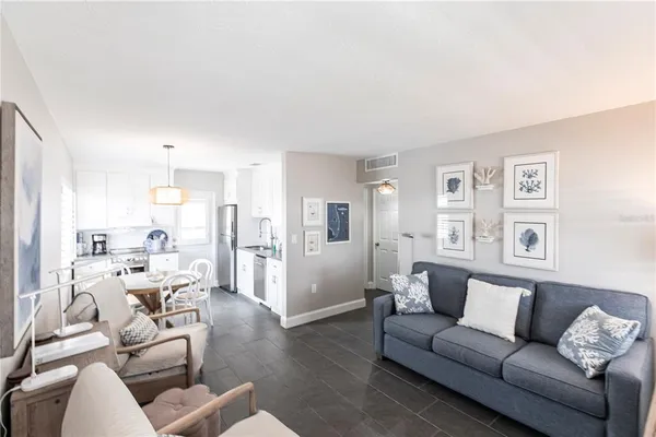 a living room with furniture and a couch