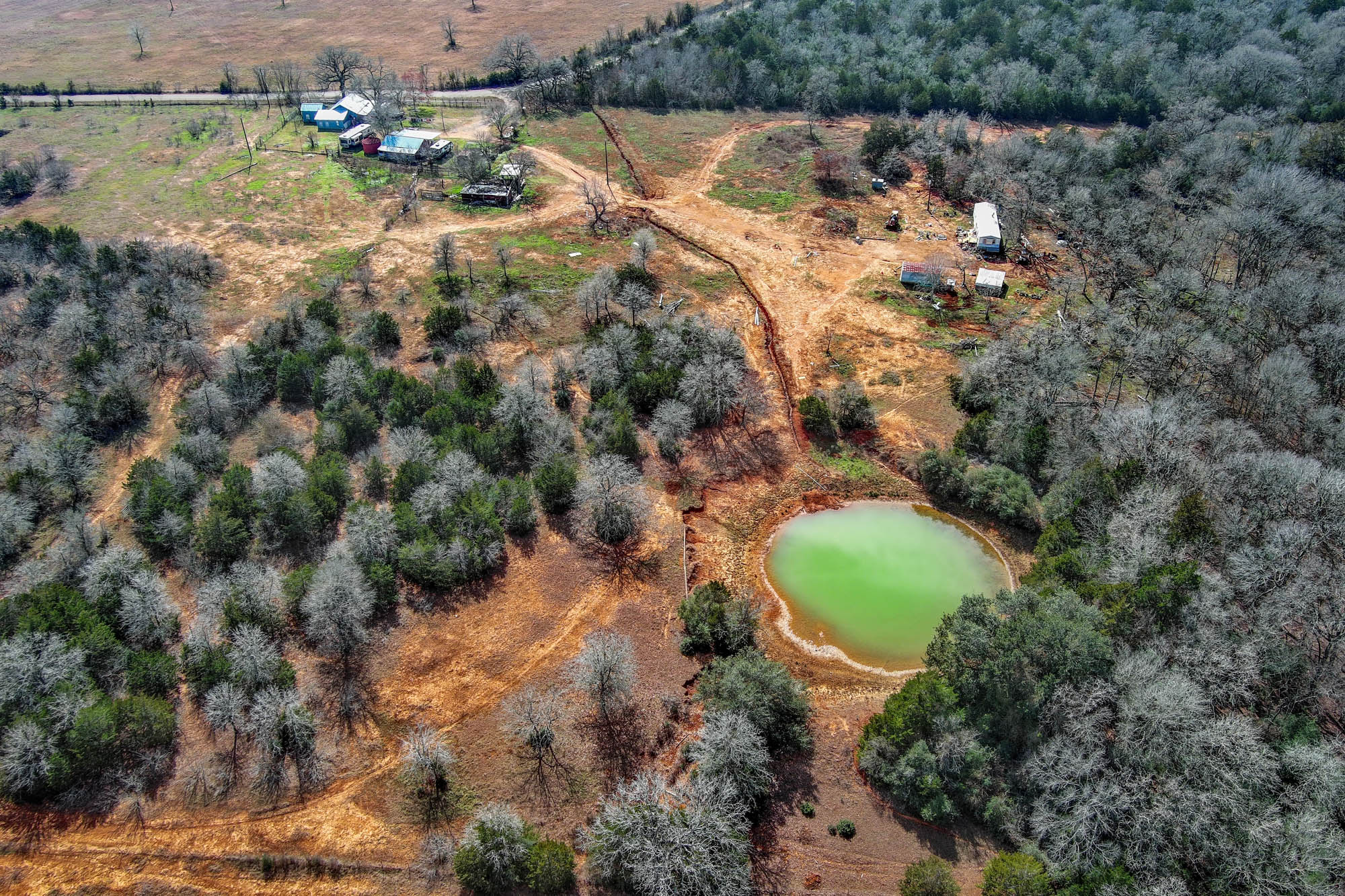 1648 Jeddo Road Rosanky, TX 78953 - Photo 21 of 32 a backyard of a house with a yard and lake view