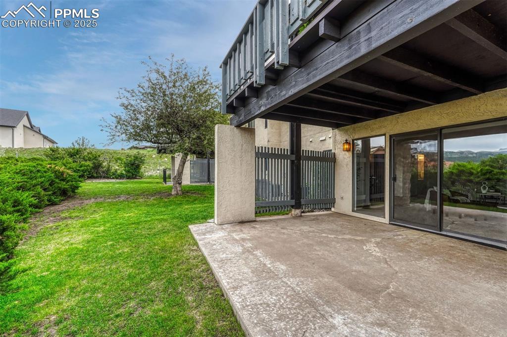 1146 Fontmore Road, Unit A Colorado Springs, CO 80904 - Photo 23 of 26 a view of porch with green space