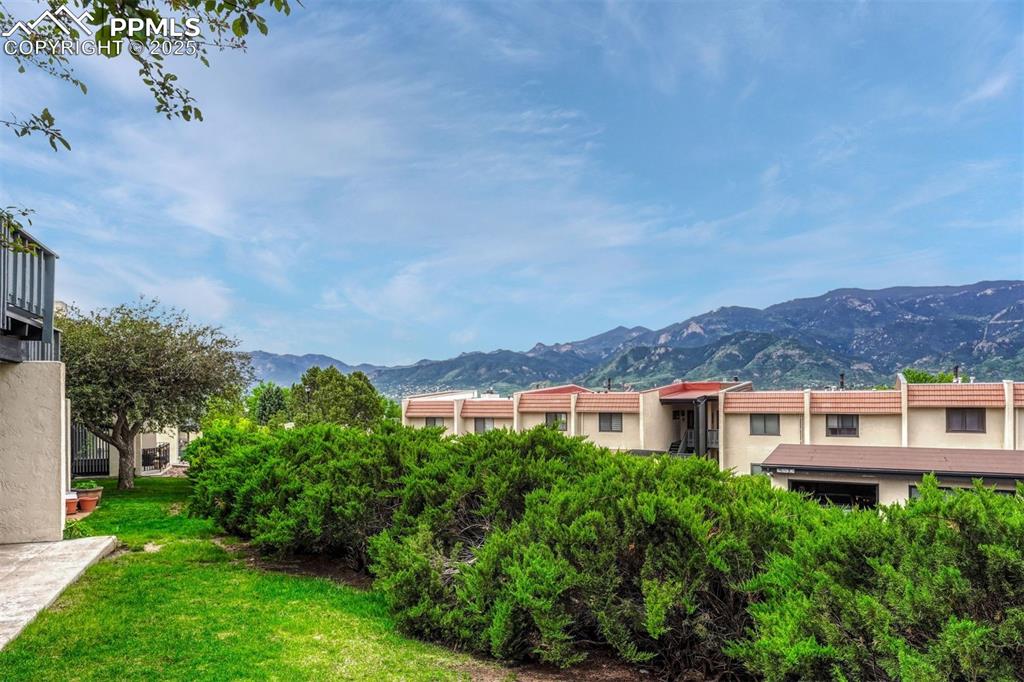 1146 Fontmore Road, Unit A Colorado Springs, CO 80904 - Photo 3 of 26 a view of a house with a backyard and a garden