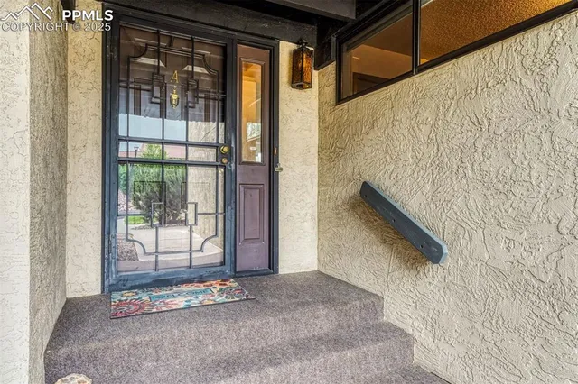 a view of walk in closet with window