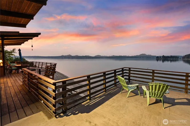 a view of a roof deck with a bench