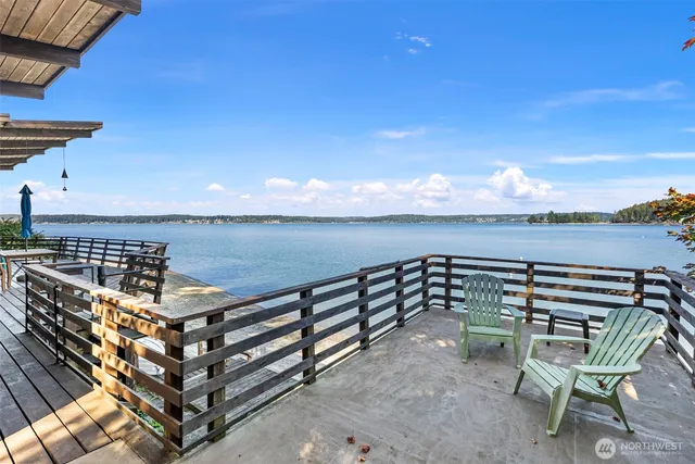 a view of a chairs and table on the terrace