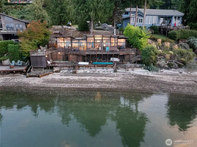 a aerial view of a house with lake view