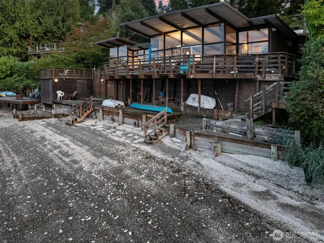 a view of a chairs and table in patio