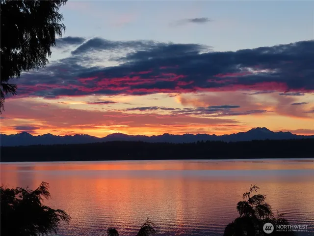 a view of lake and mountain