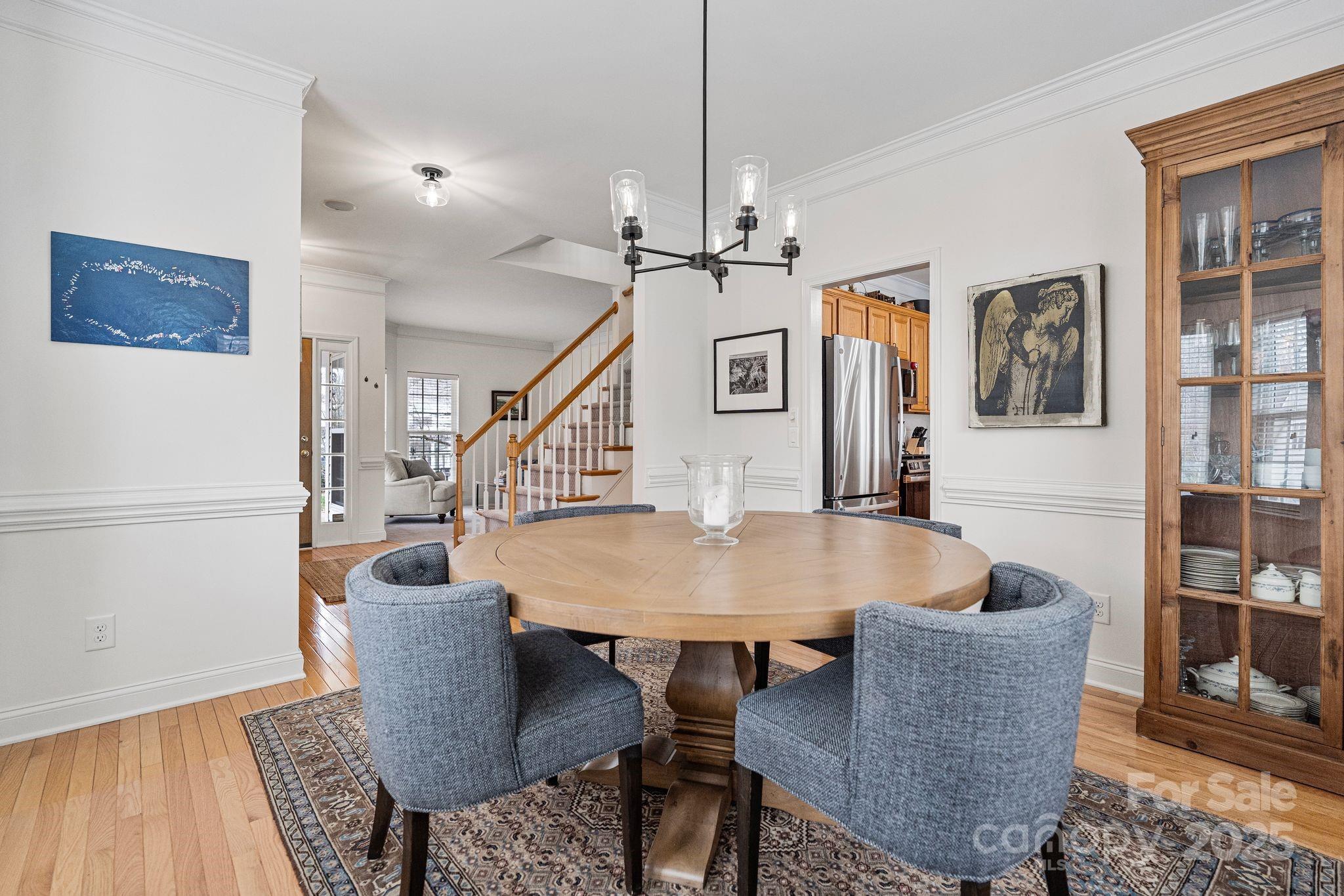 19302 Ruffner Drive Cornelius, NC 28031 - Photo 12 of 44 a view of a dining room with furniture