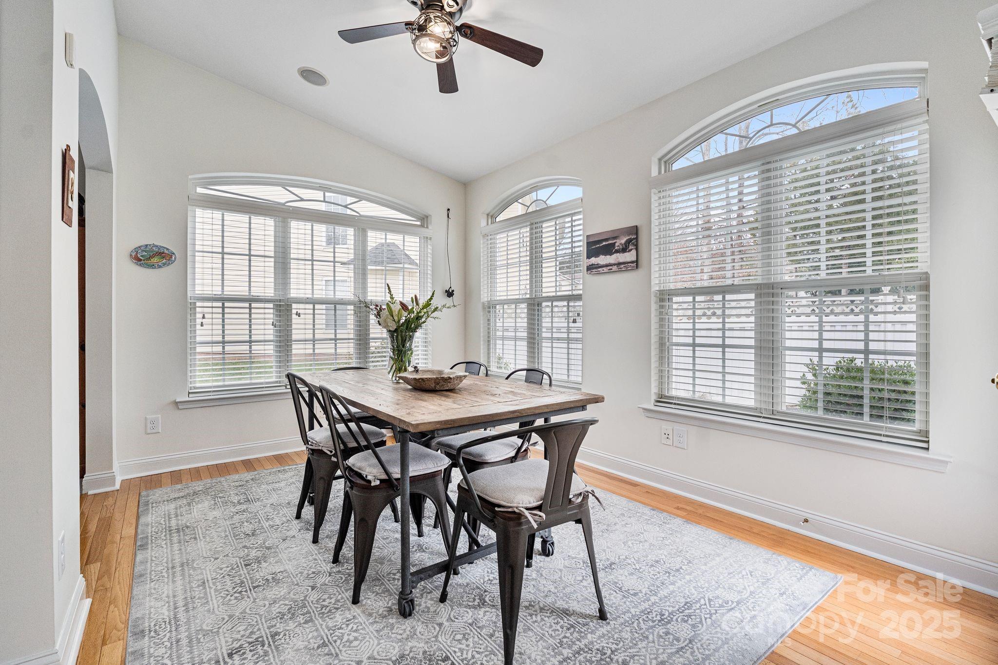 19302 Ruffner Drive Cornelius, NC 28031 - Photo 19 of 44 a view of a dining room with furniture window and outside view