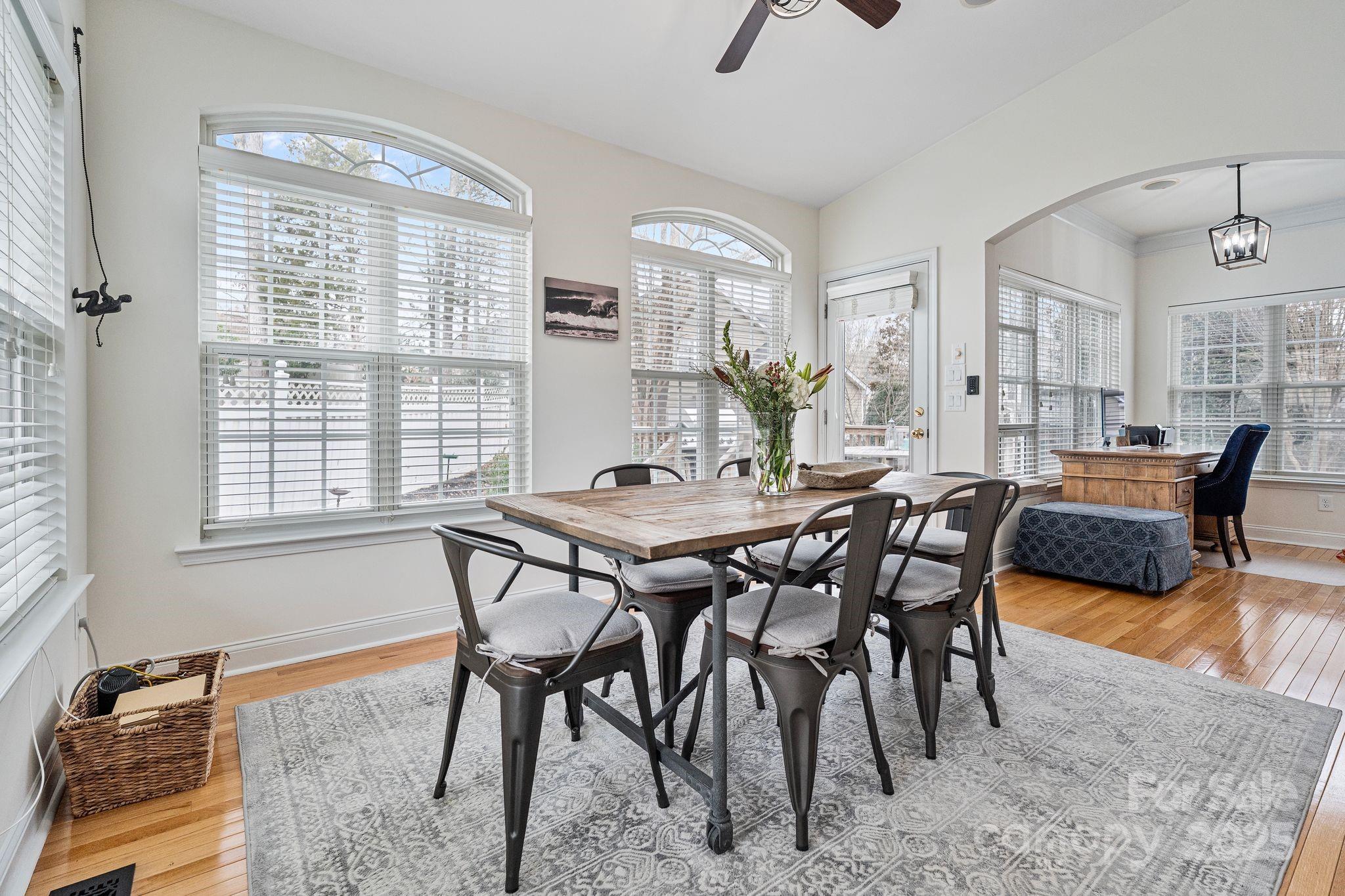 19302 Ruffner Drive Cornelius, NC 28031 - Photo 20 of 44 a view of a dining room with furniture and a window