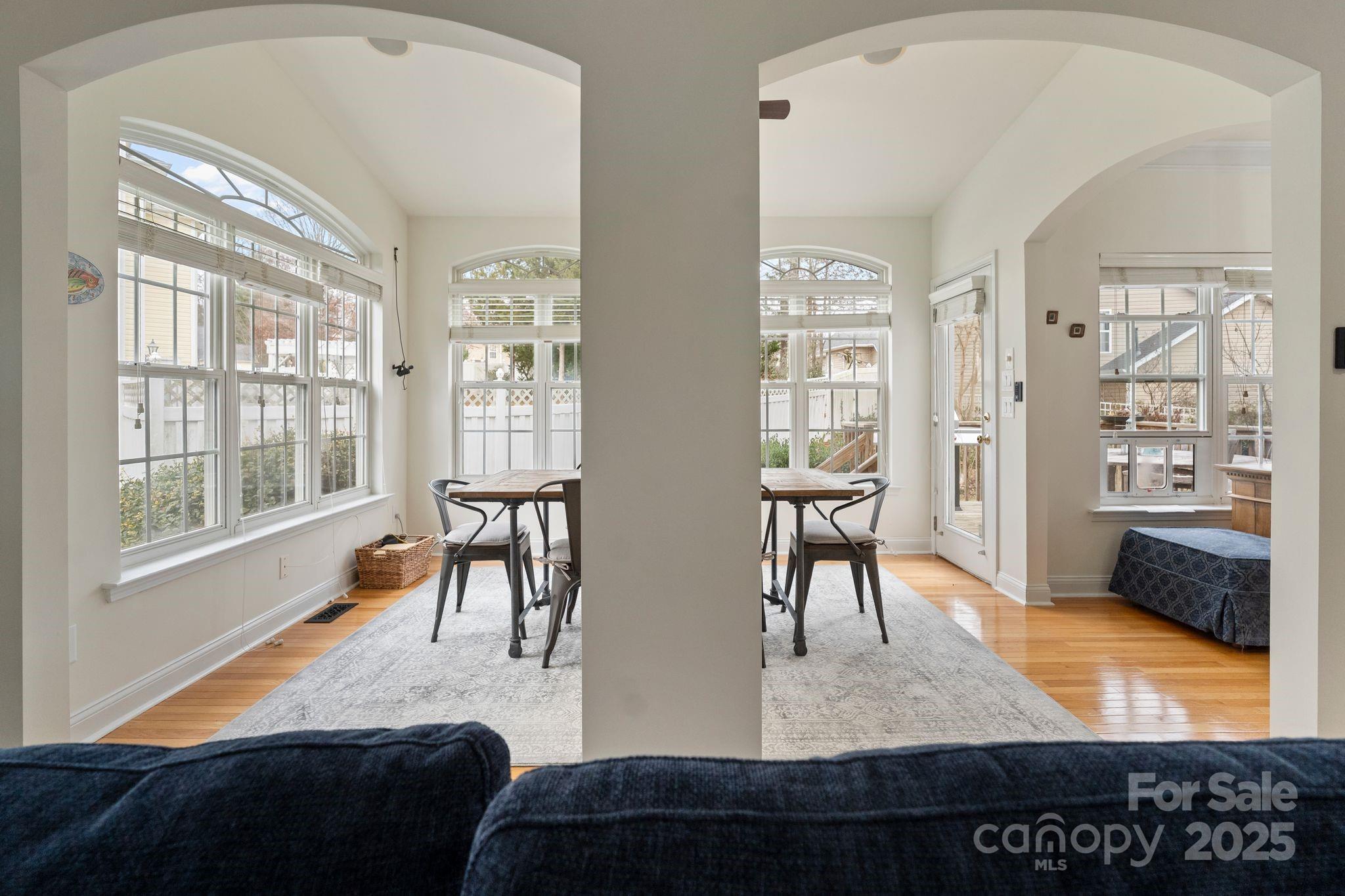 19302 Ruffner Drive Cornelius, NC 28031 - Photo 21 of 44 a living room with furniture and a table