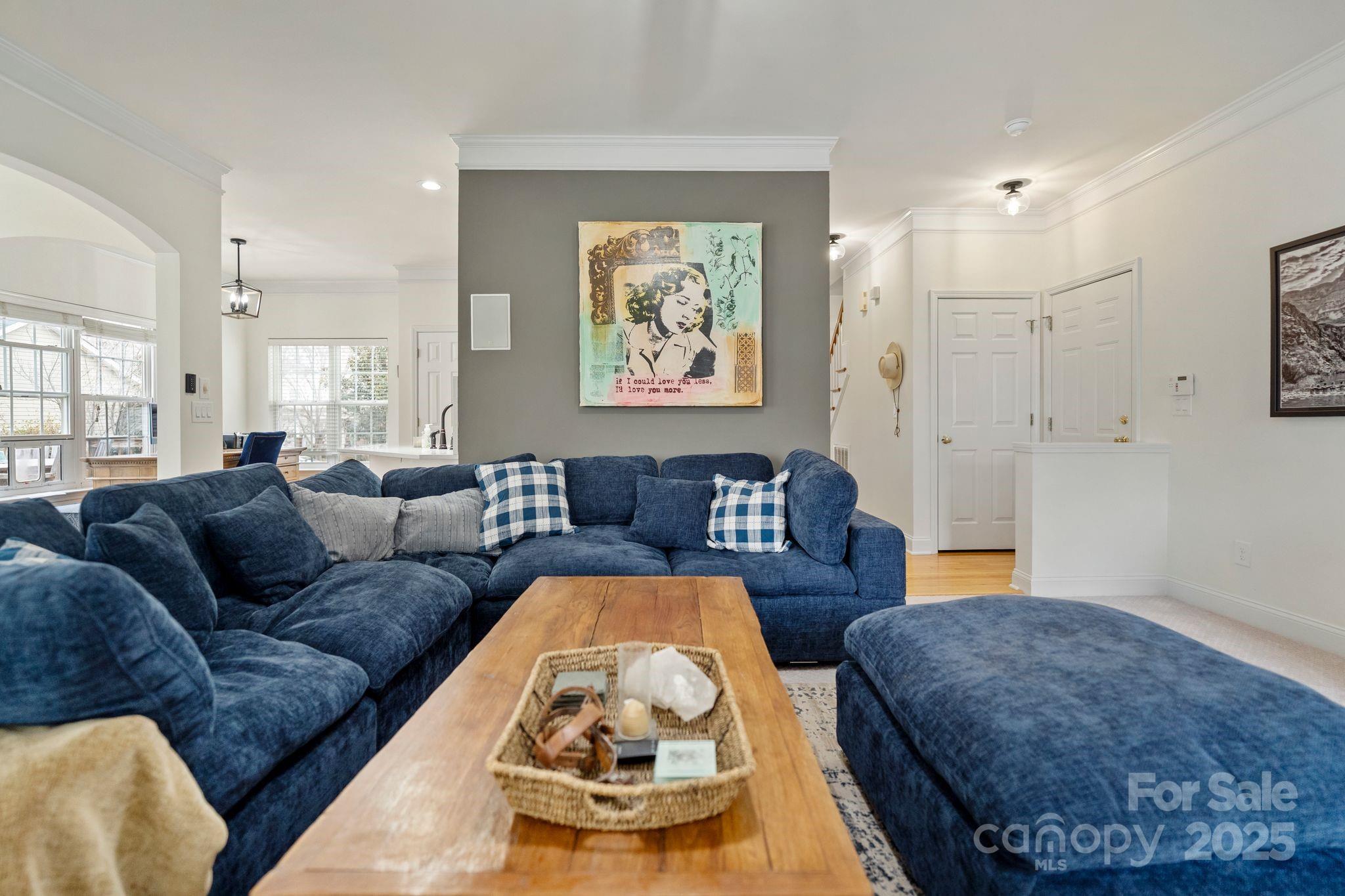 19302 Ruffner Drive Cornelius, NC 28031 - Photo 23 of 44 a living room with furniture and a large window
