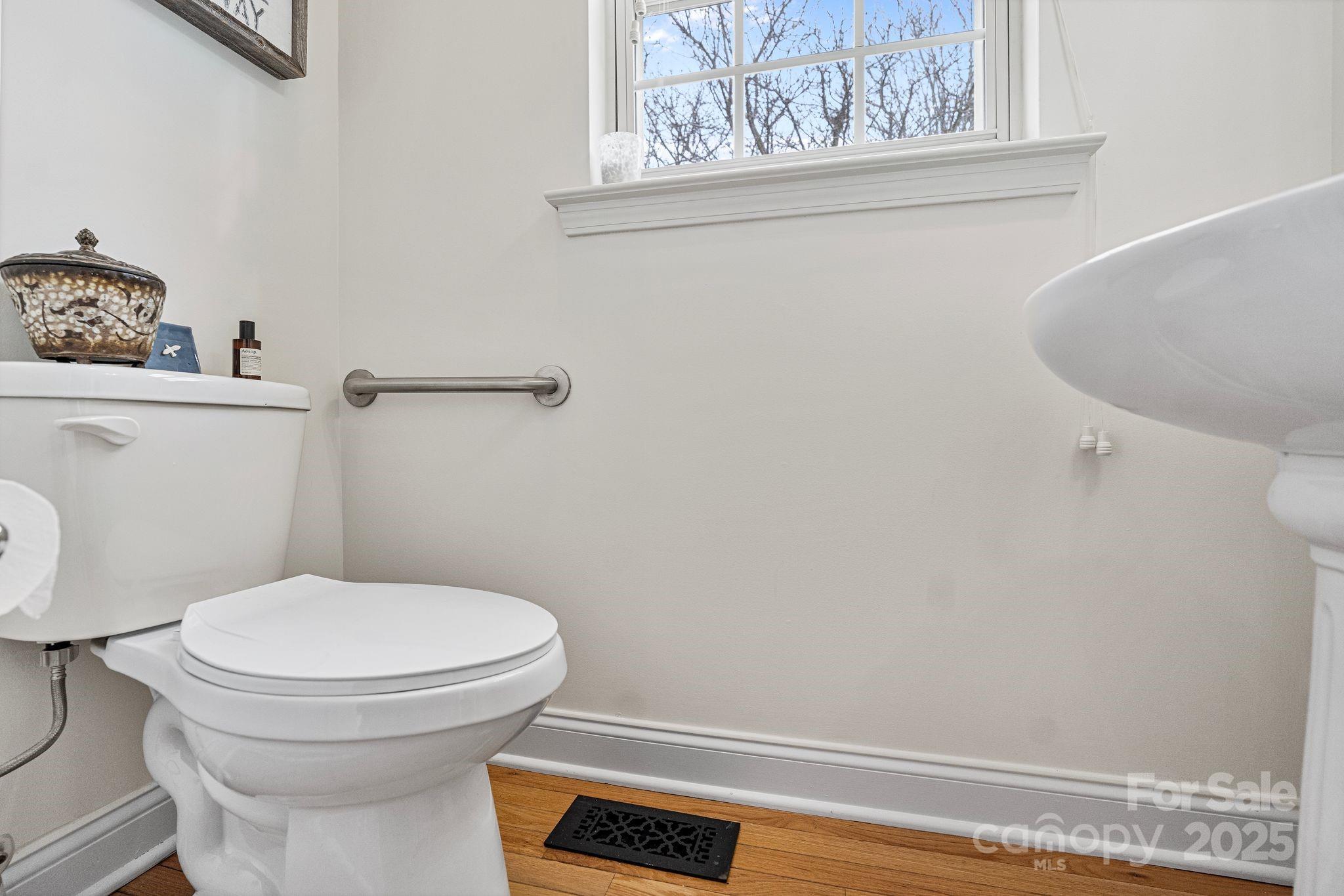 19302 Ruffner Drive Cornelius, NC 28031 - Photo 41 of 44 a bathroom with a toilet and a sink