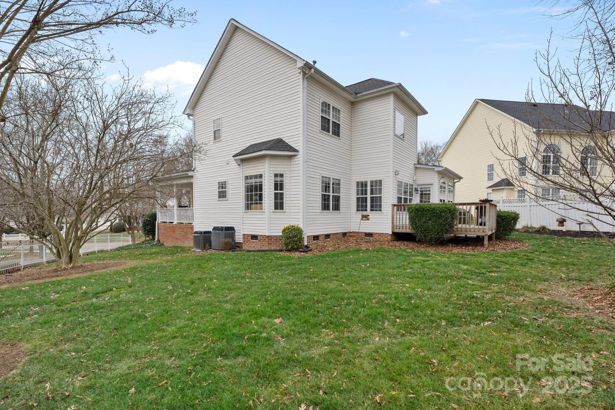 19302 Ruffner Drive Cornelius, NC 28031 - Photo 42 of 44 a view of a house with a backyard