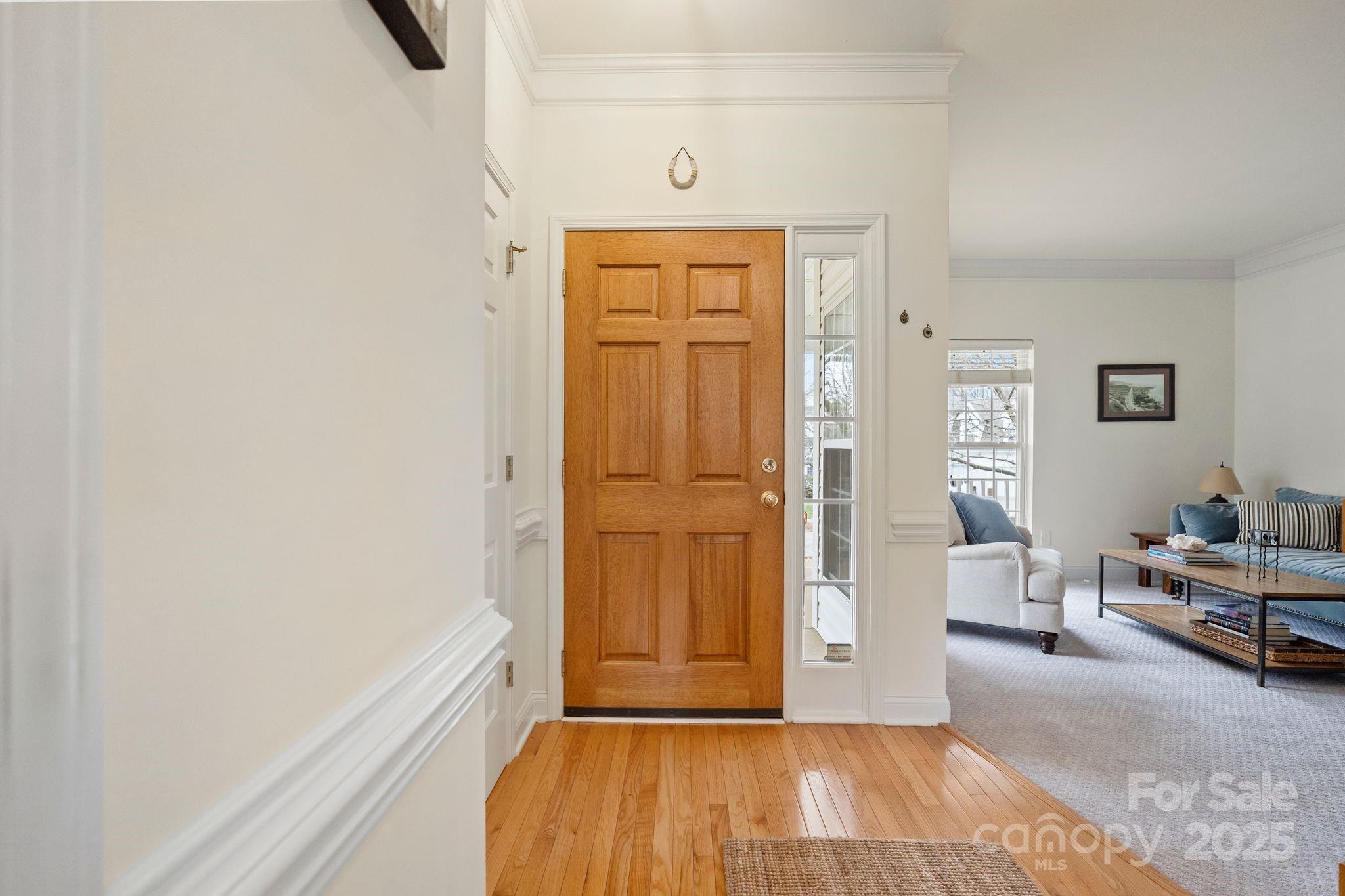 19302 Ruffner Drive Cornelius, NC 28031 - Photo 6 of 44 a view of a livingroom with wooden floor and furniture