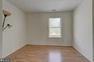 1543 Holbrook Street Baltimore, MD 21202 - Photo 21 of 23 an empty room with a window