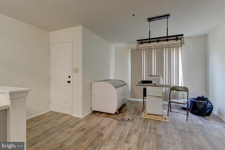 1543 Holbrook Street Baltimore, MD 21202 - Photo 6 of 23 a view of a livingroom with furniture and a window
