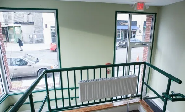 a view of balcony with furniture