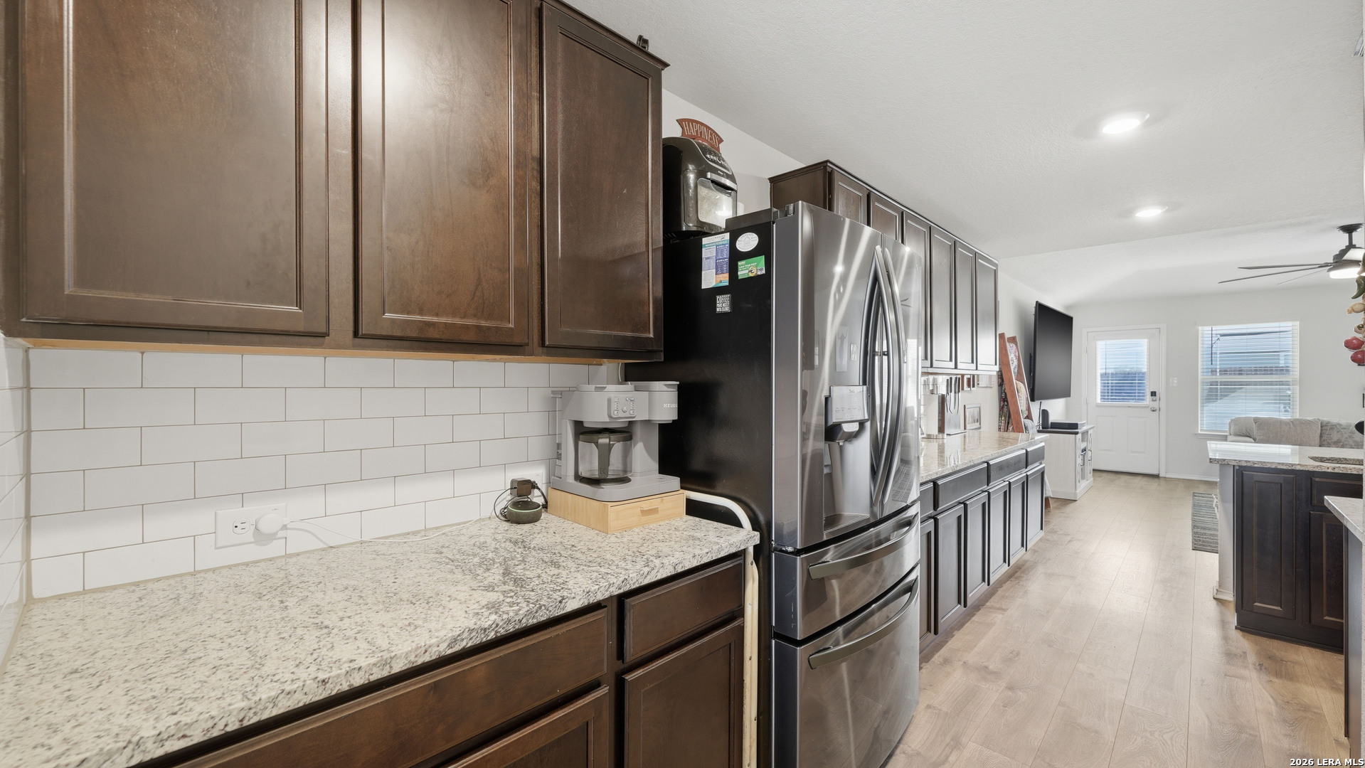3649 Copper Bulverde, TX 78163 - Photo 12 of 45 a kitchen with stainless steel appliances granite countertop a refrigerator and a sink