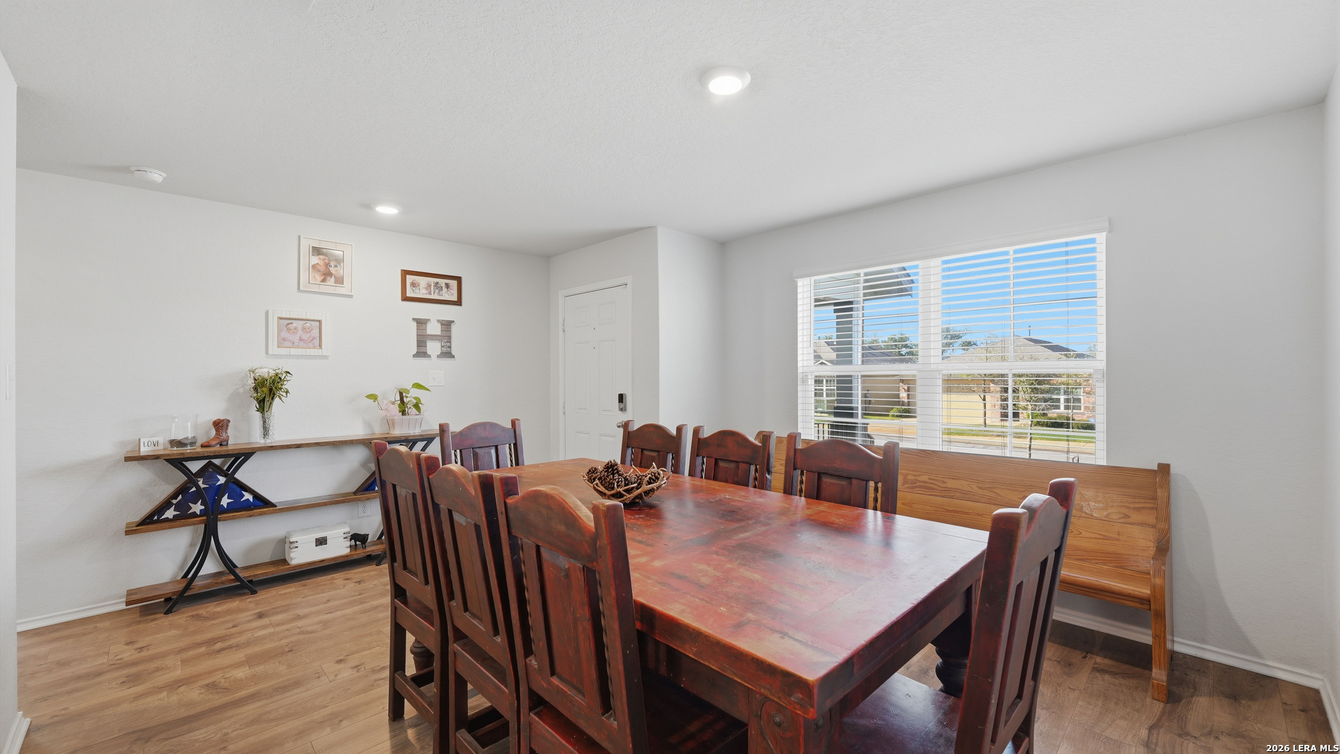 3649 Copper Bulverde, TX 78163 - Photo 17 of 45 a view of a a dining room with furniture window and wooden floor