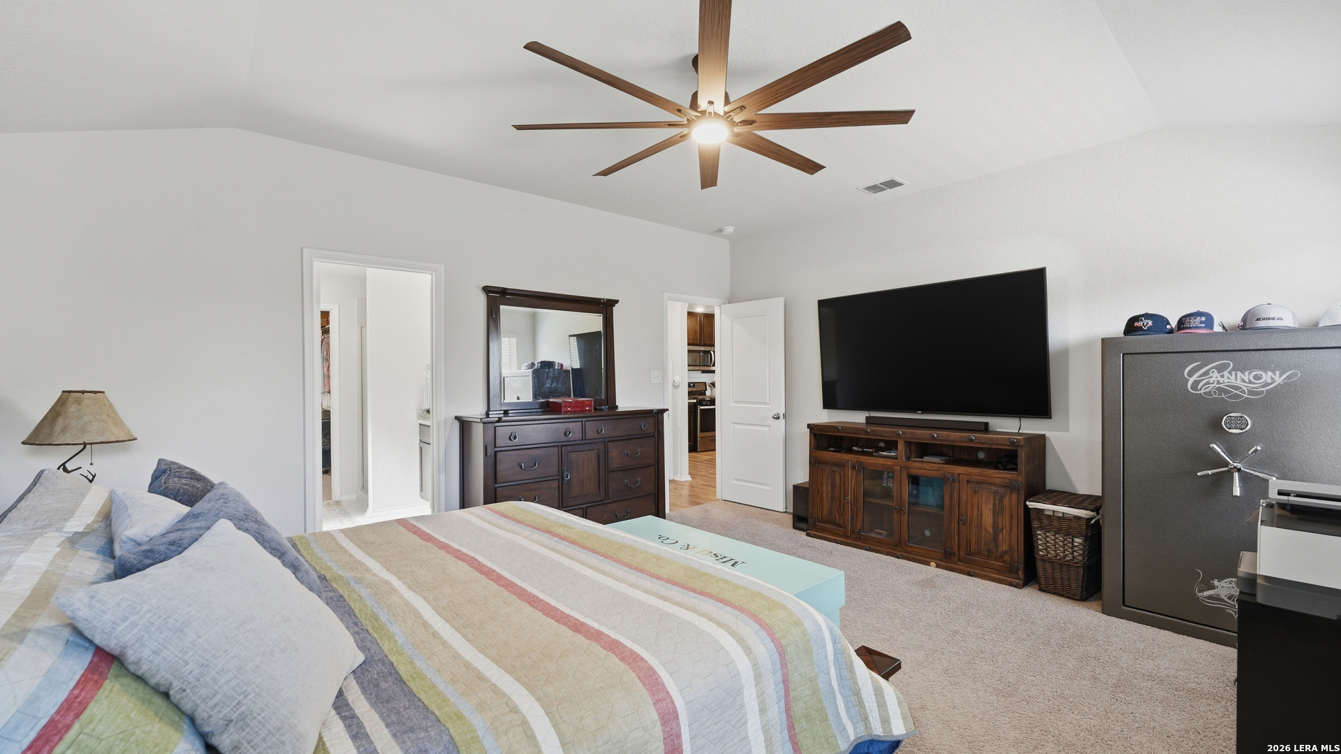 3649 Copper Bulverde, TX 78163 - Photo 19 of 45 a bedroom with a bed and a flat screen tv