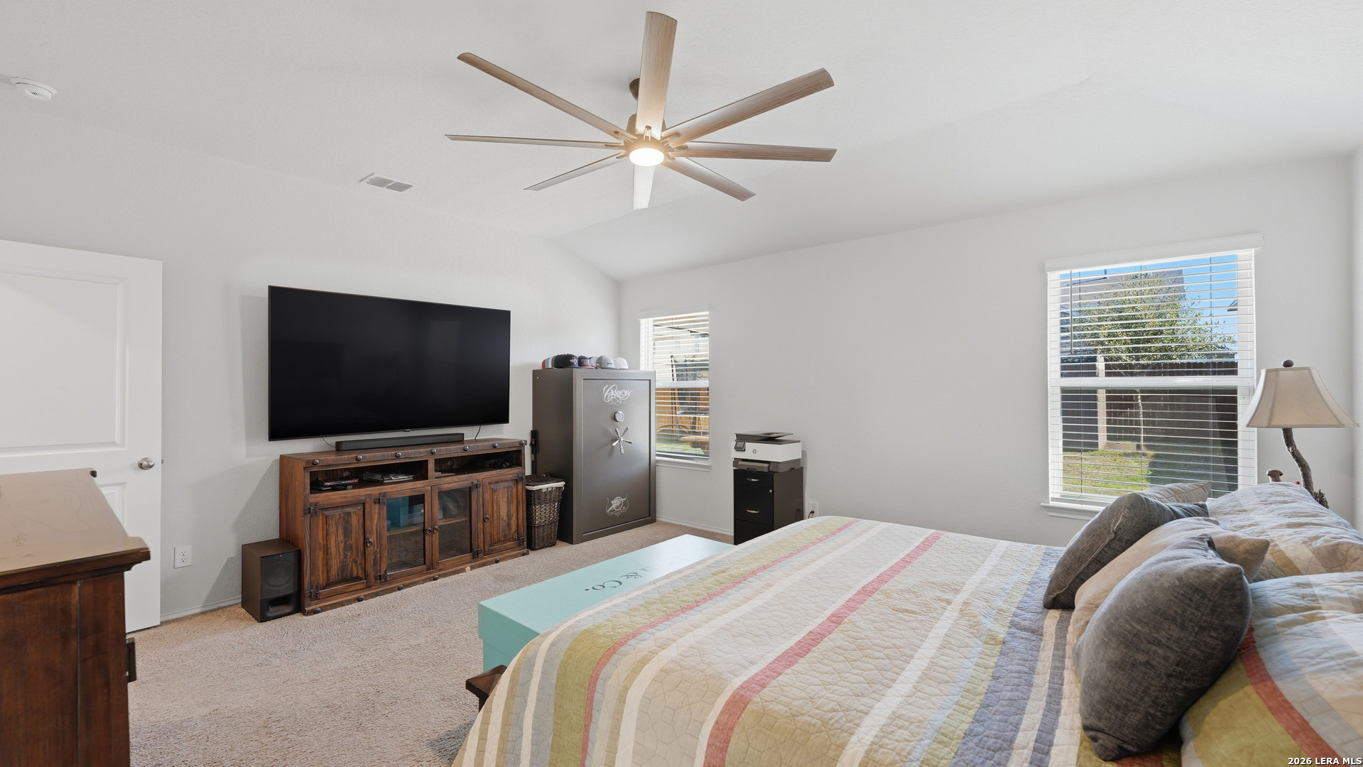 3649 Copper Bulverde, TX 78163 - Photo 21 of 45 a bedroom with a bed and a flat screen tv