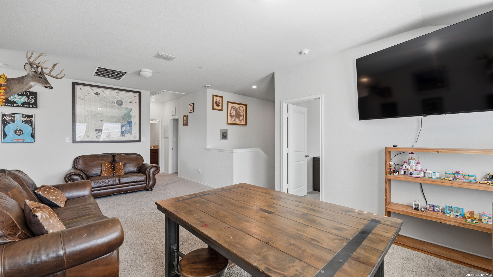 3649 Copper Bulverde, TX 78163 - Photo 27 of 45 a bedroom with furniture and a flat screen tv