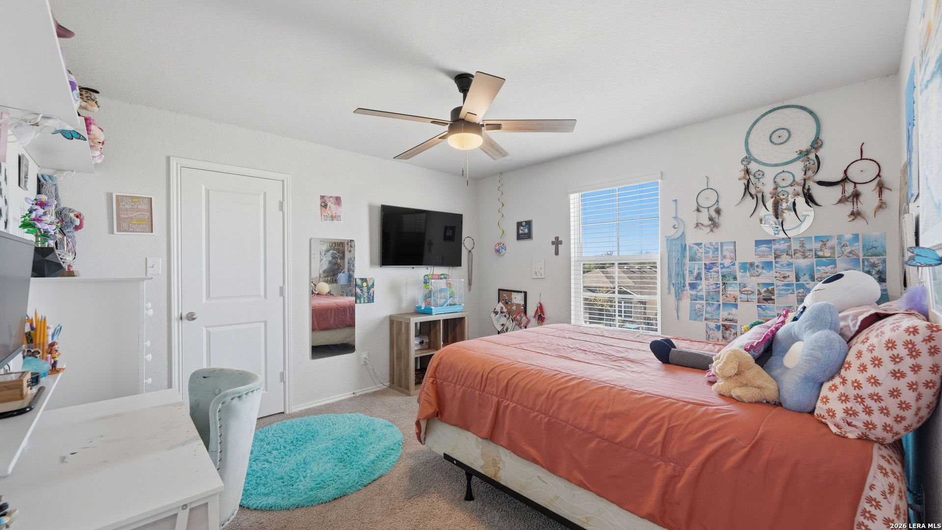 3649 Copper Bulverde, TX 78163 - Photo 31 of 45 a bedroom with a bed and a flat screen tv