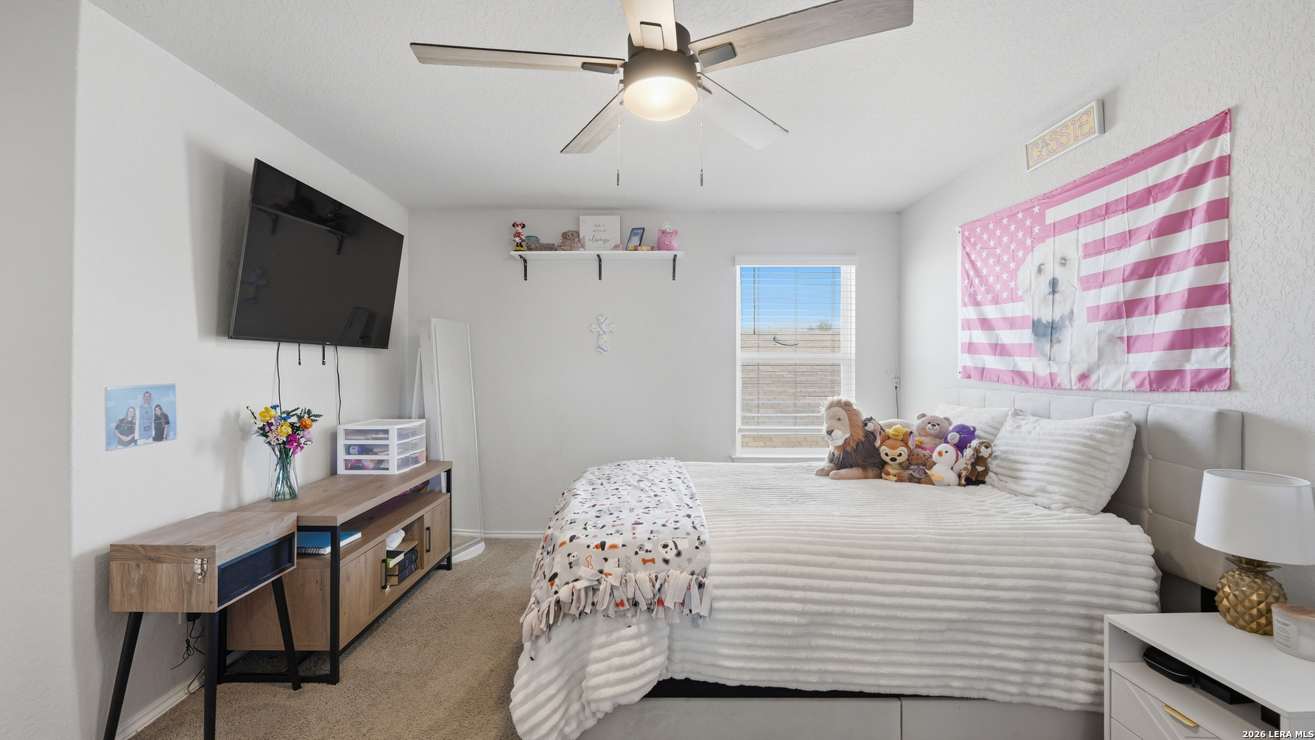 3649 Copper Bulverde, TX 78163 - Photo 32 of 45 a bedroom with a bed and a flat screen tv