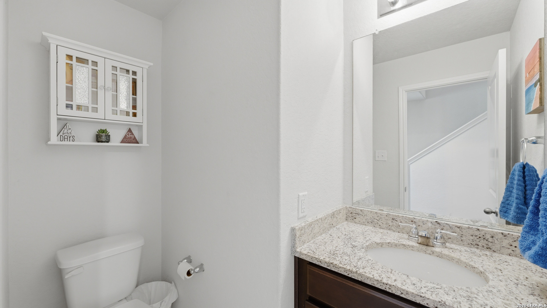 3649 Copper Bulverde, TX 78163 - Photo 36 of 45 a bathroom with a granite countertop sink and a mirror