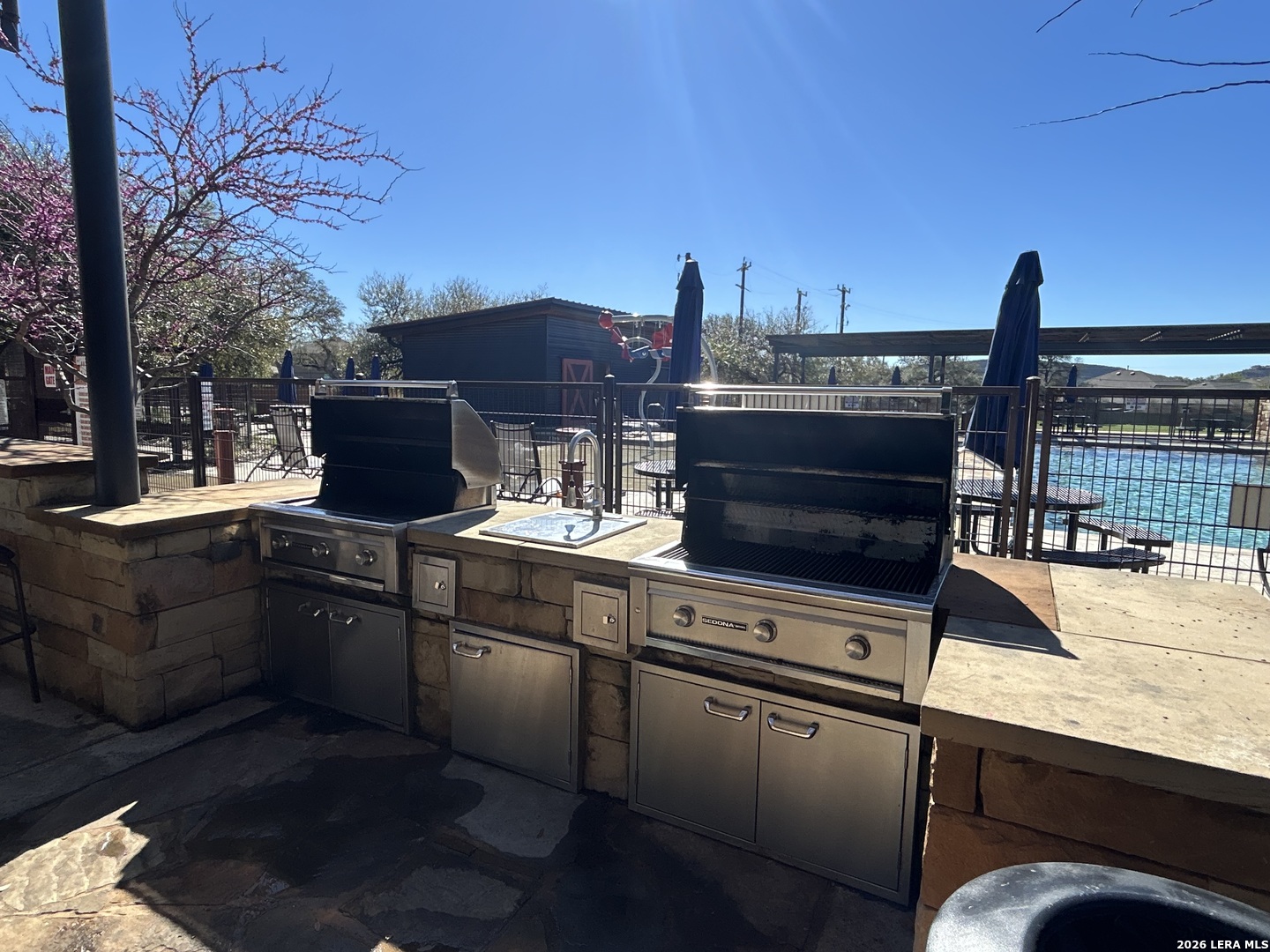 3649 Copper Bulverde, TX 78163 - Photo 40 of 45 a kitchen with a sink and cabinets