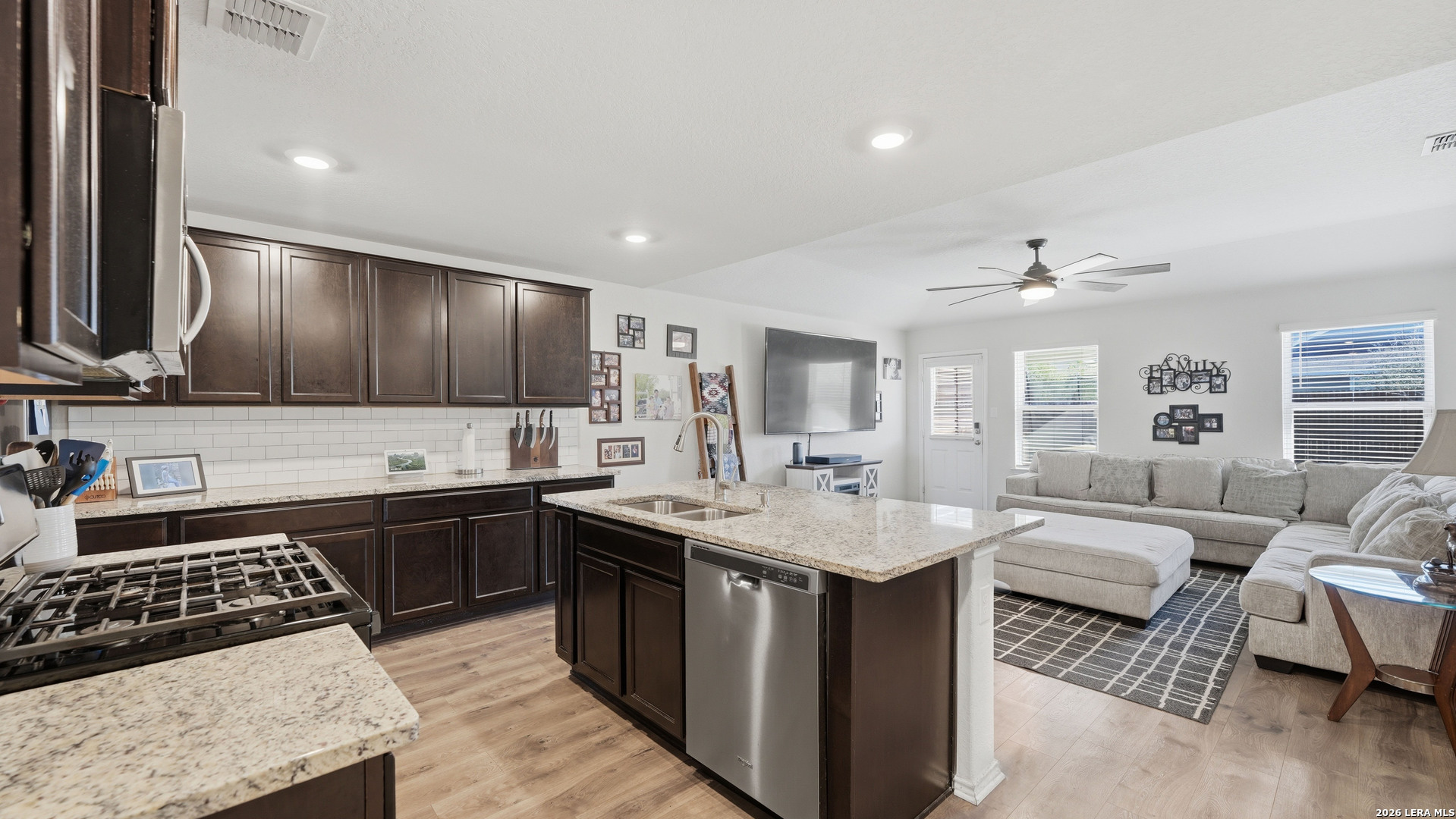 3649 Copper Bulverde, TX 78163 - Photo 8 of 45 a kitchen with stainless steel appliances granite countertop a sink stove and refrigerator