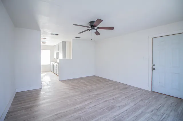 a view of an empty room and window