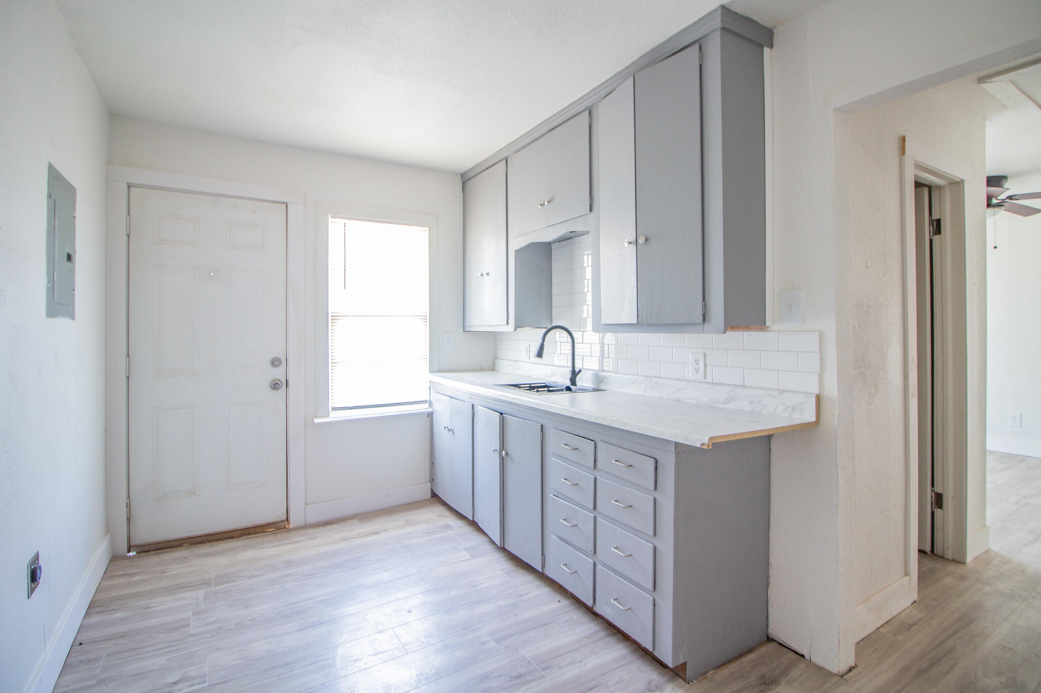 302 Avenue U Lubbock, TX 79415 - Photo 25 of 26 a bathroom with a sink double vanity and a mirror