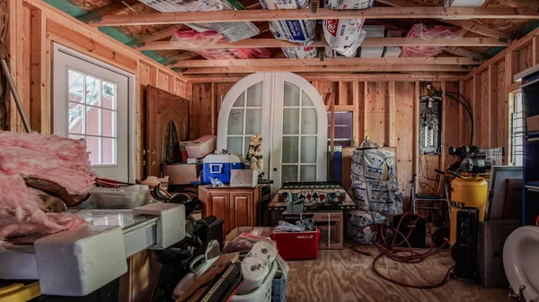 a view of gym equipment and storage area