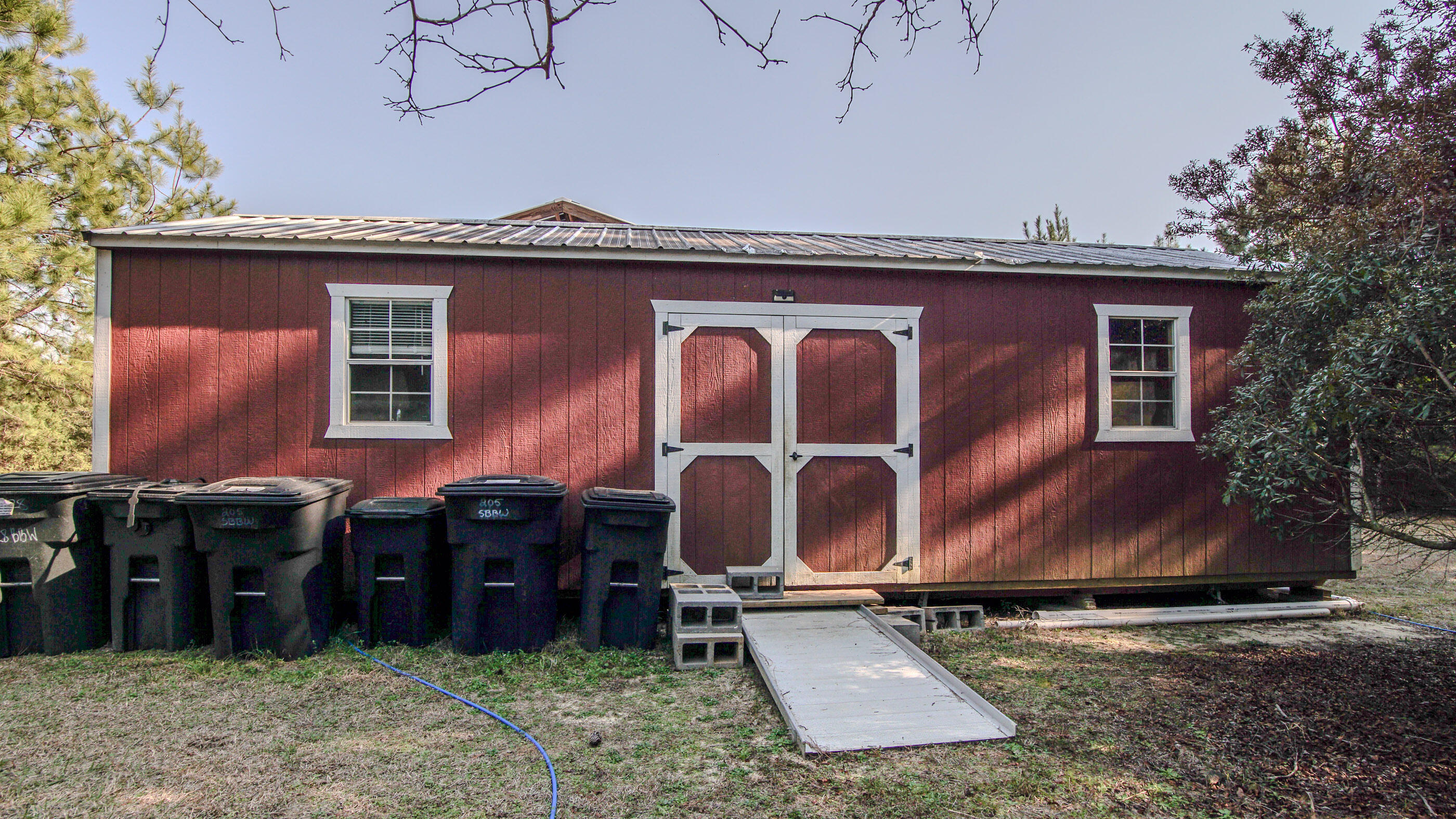 2444 Hardy Skipper Road Ponce de Leon, FL 32455 - Photo 3 of 21 a view of a back yard of the house