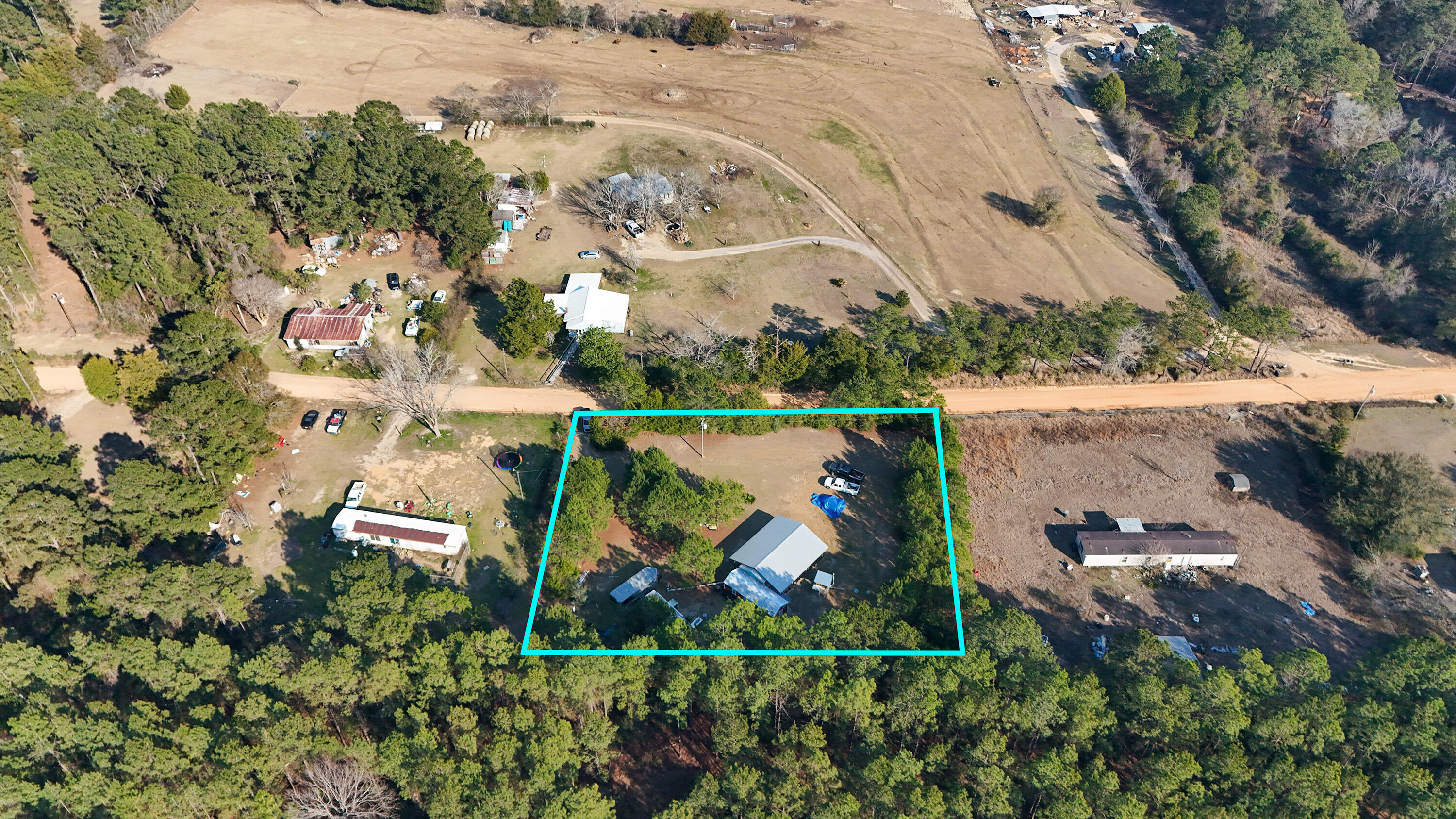 2444 Hardy Skipper Road Ponce de Leon, FL 32455 - Photo 4 of 21 an aerial view of a houses with a yard