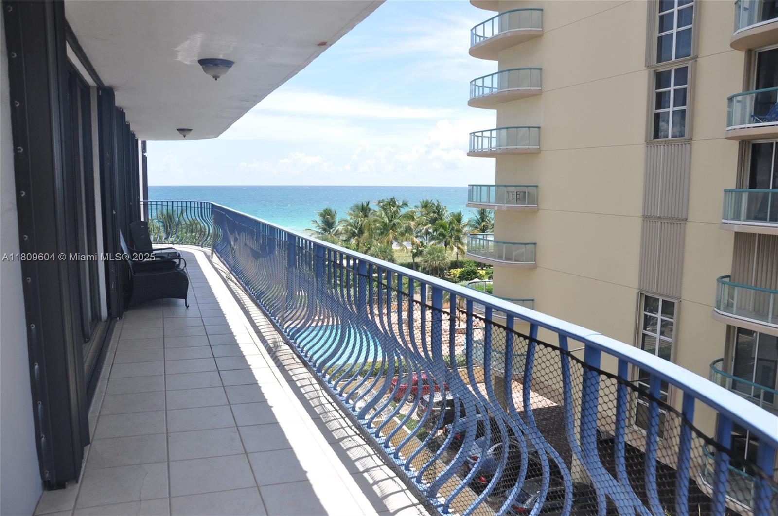8877 Collins Avenue, Unit 507 Surfside, FL 33154 - Photo 4 of 5 a view of balcony with furniture