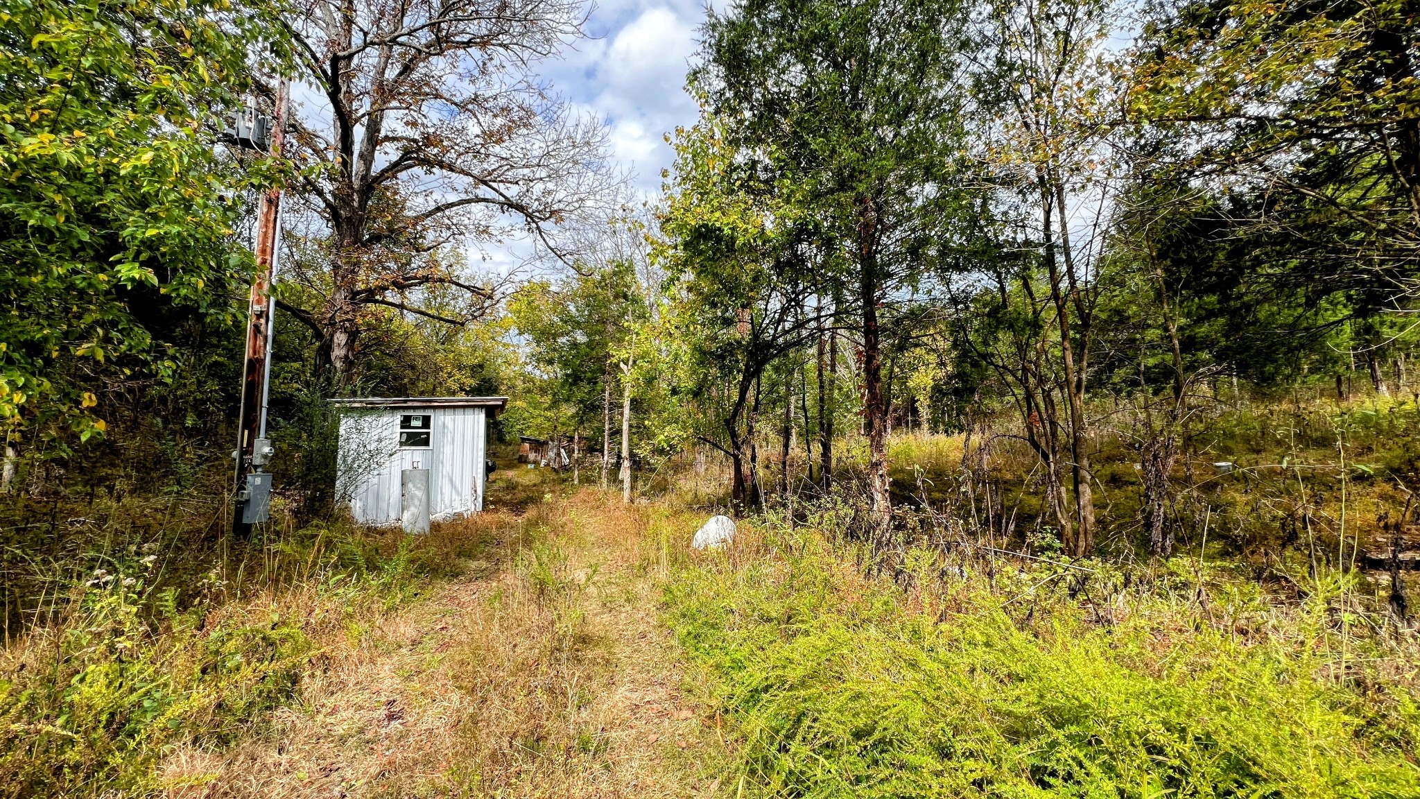 441 Pumpkin Hollow Road Liberty, TN 37095 - Photo 14 of 29 a sign of the house next to a yard